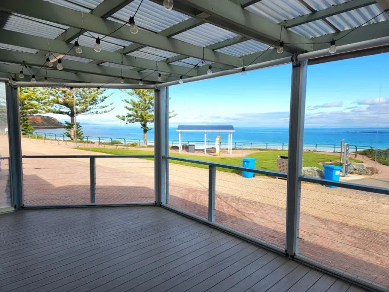 Beach cafe with clear blinds
