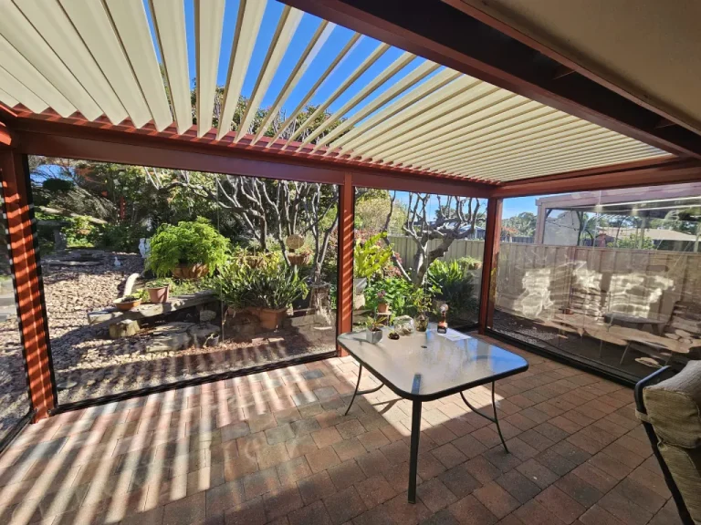 Clear cafe blinds around private outdoor eating area